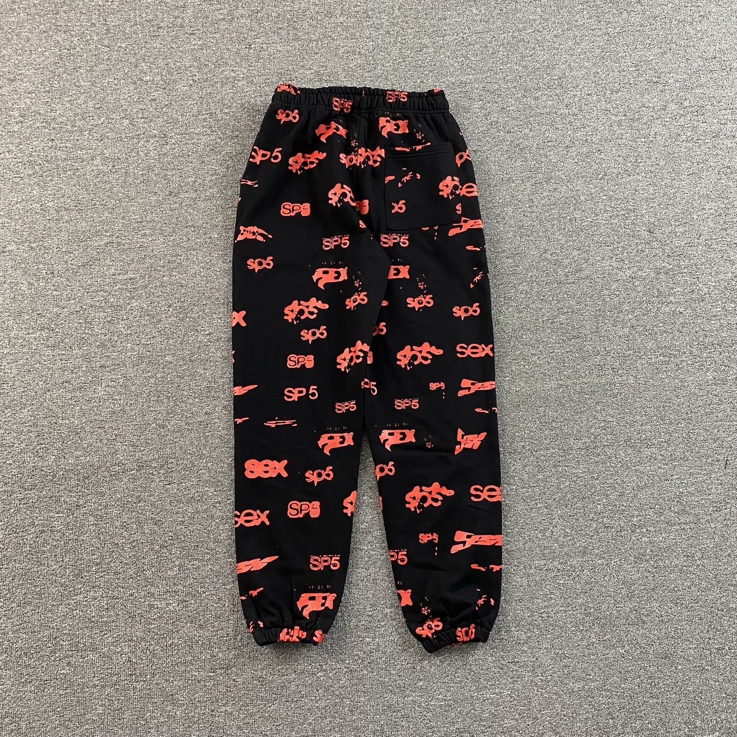 SP5DER SEX AOP SWEATPANTS BLACK