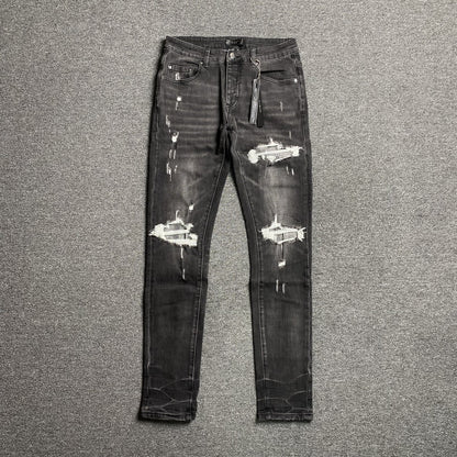 AMIRI SLASH SLIM JEANS