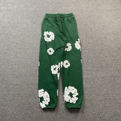 DENIM TEARS COTTON WREATH SWEATPANTS DARK GREEN