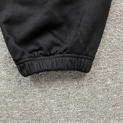 DENIM TEARS COTTON WREATH SWEATPANTS MONOCHROME BLACK